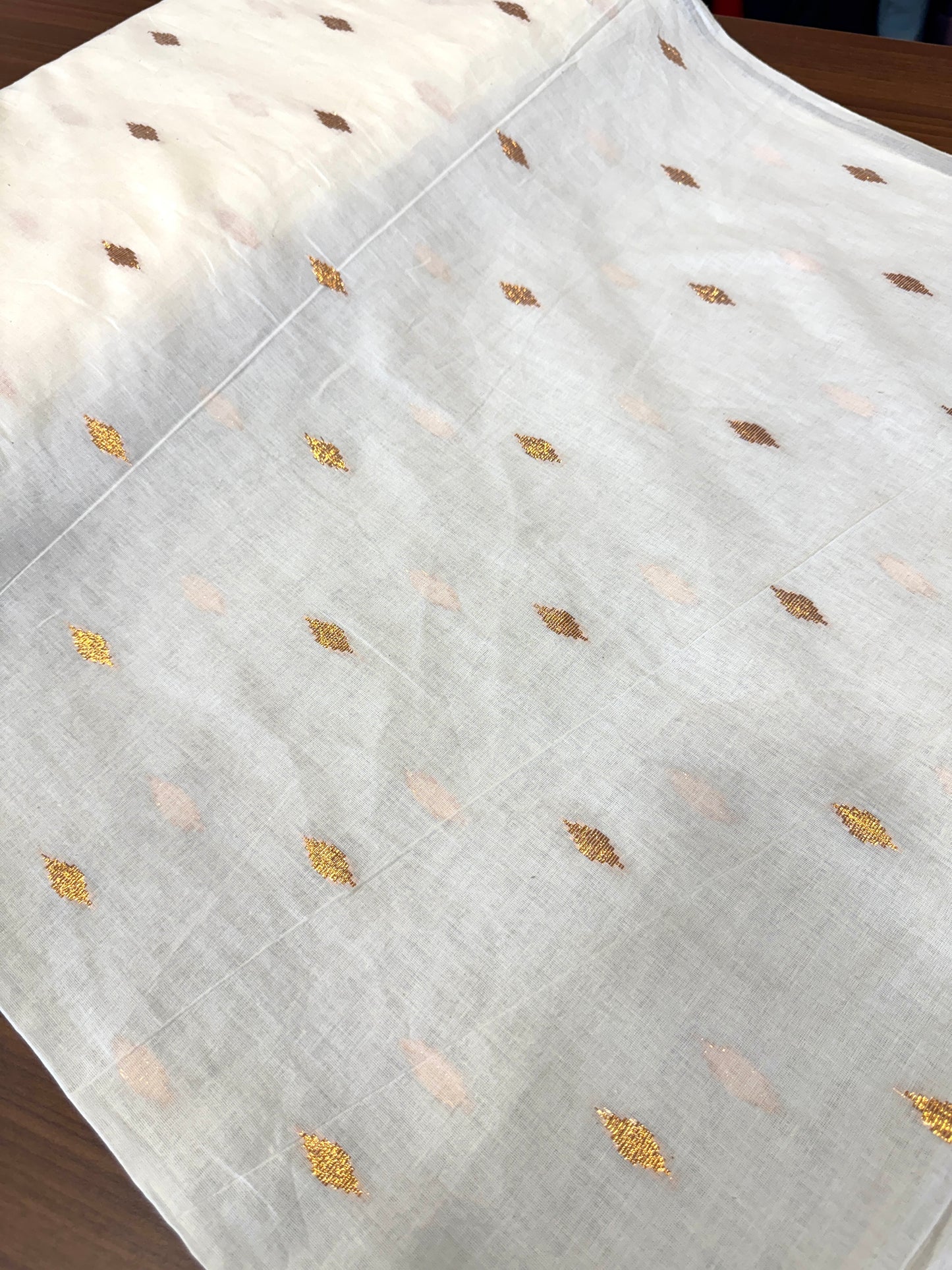 Dyeable cotton with copper zari weave