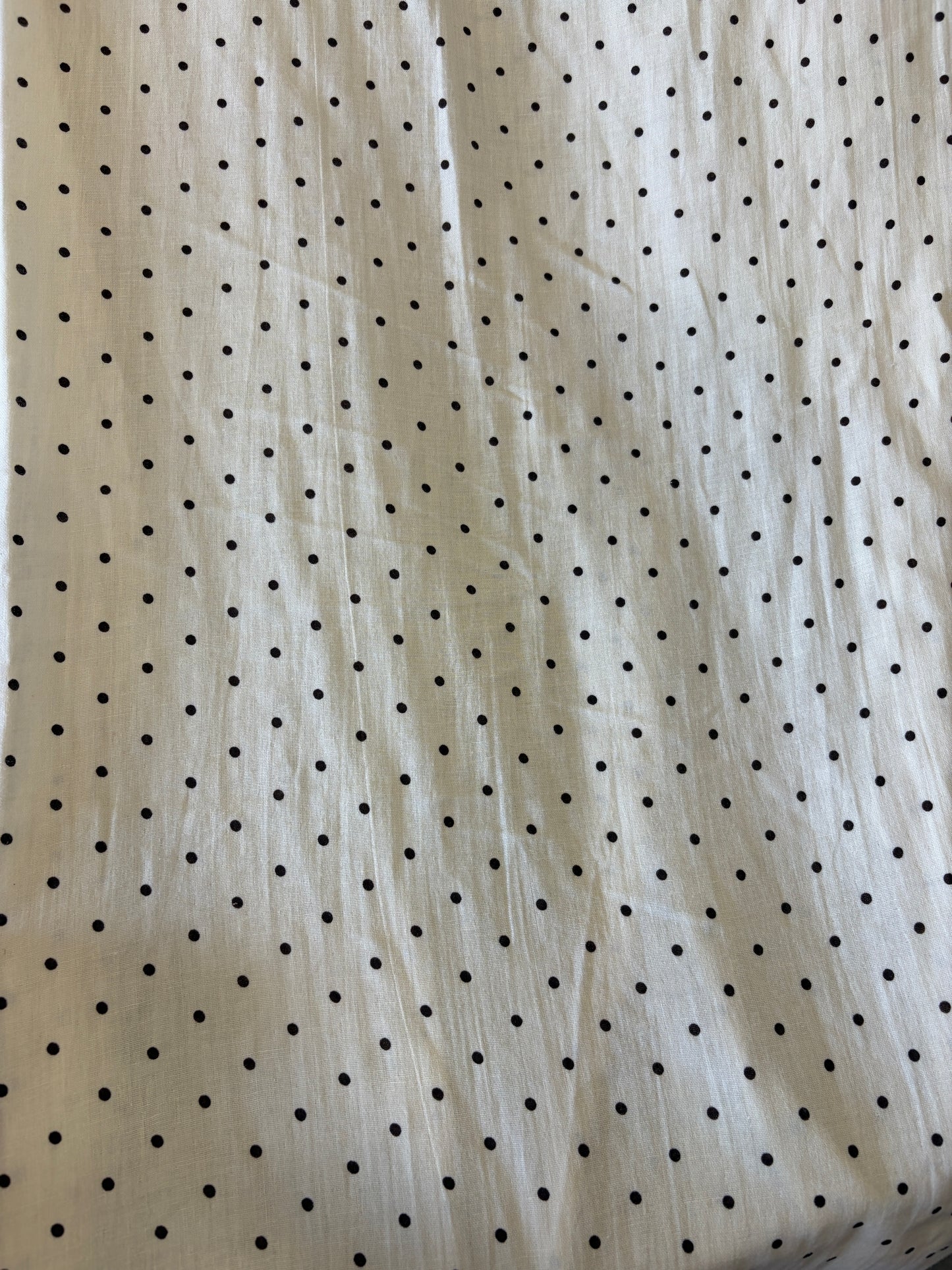 Muslin cotton with black polka prints