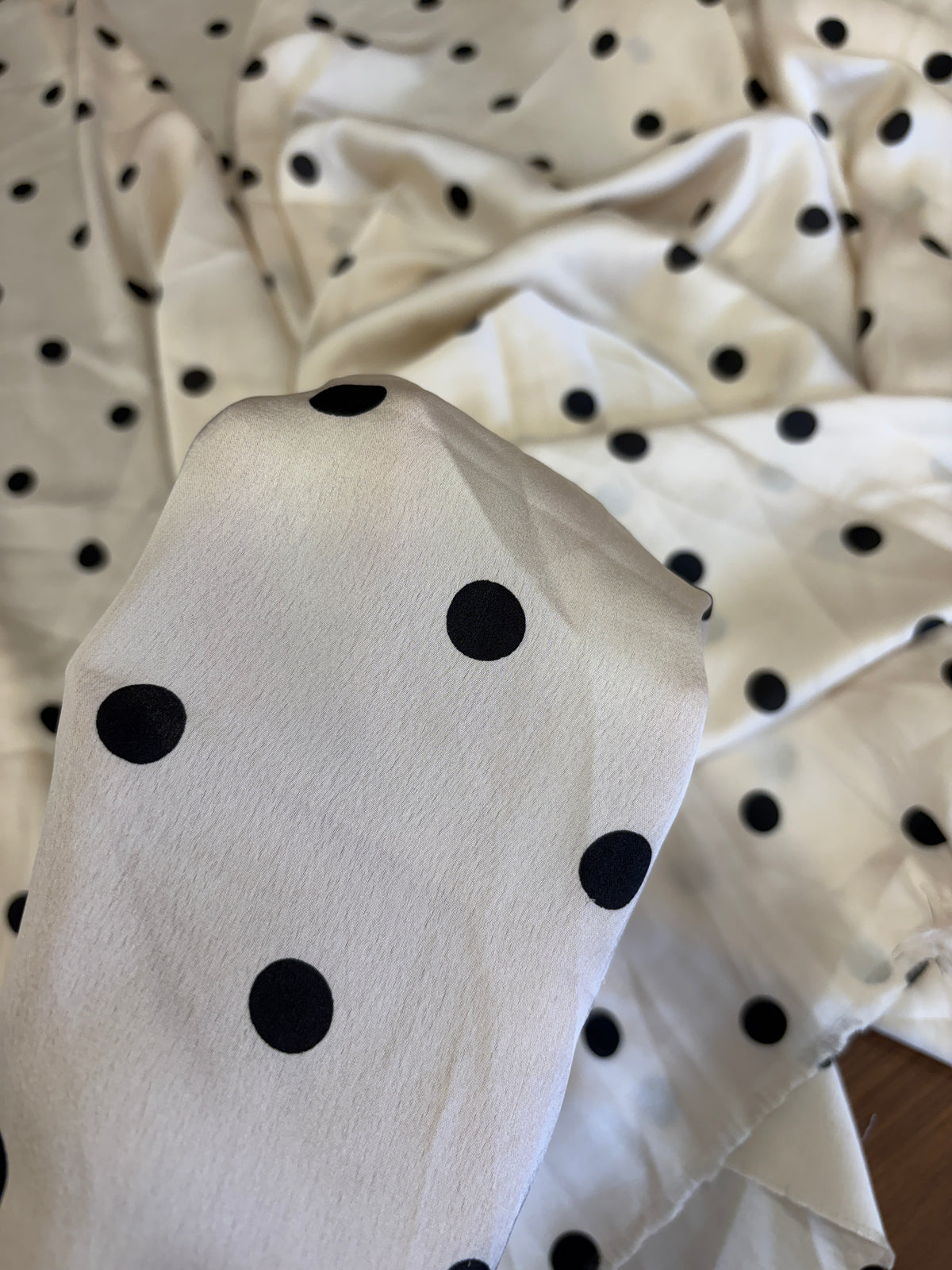 Printed black polka on satin