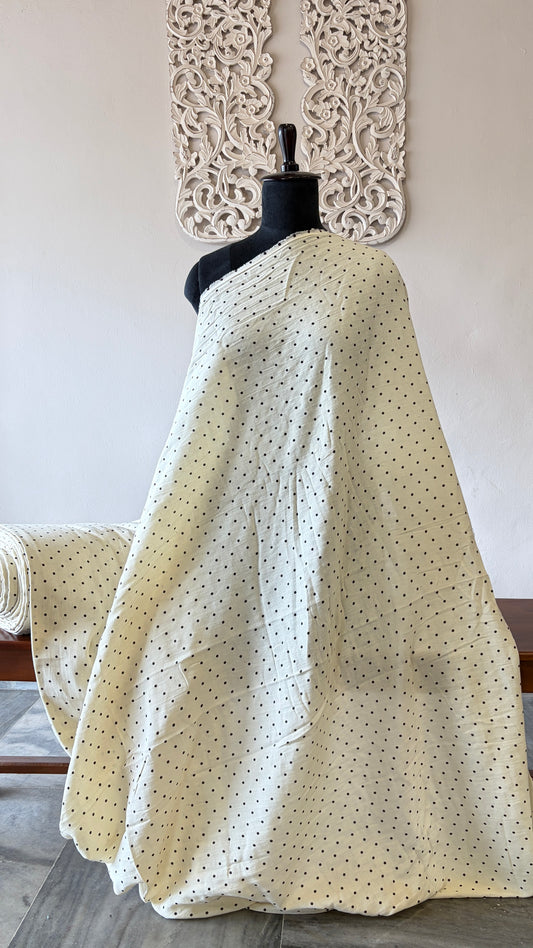 Muslin cotton with black polka prints