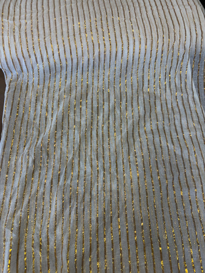 Mulcotton fabric with gold lurex line