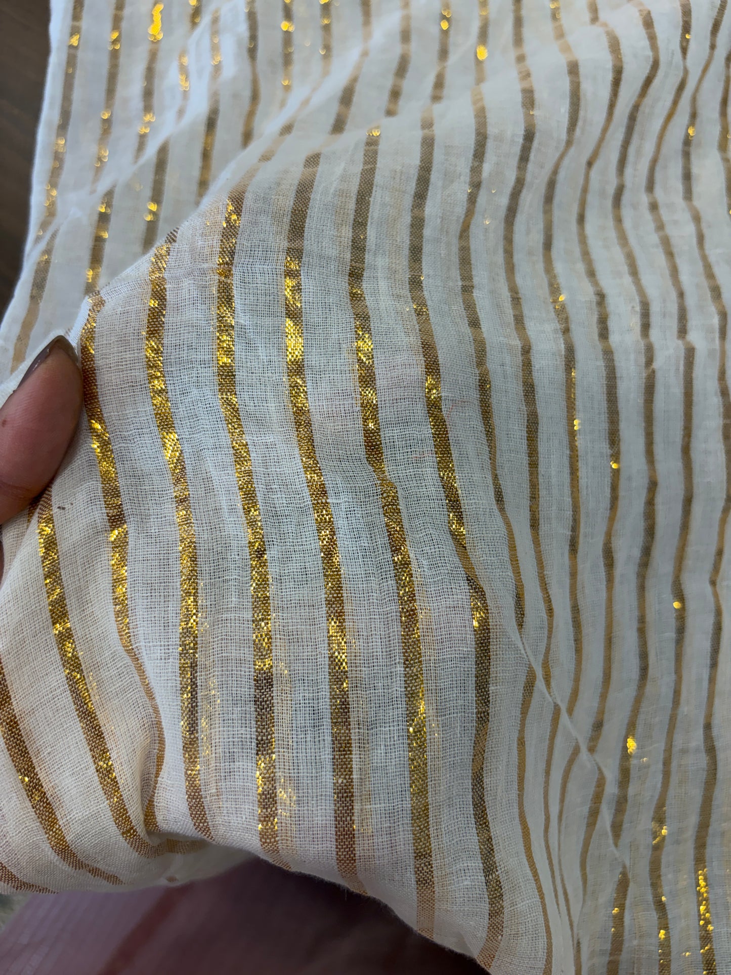 Mulcotton fabric with gold lurex line