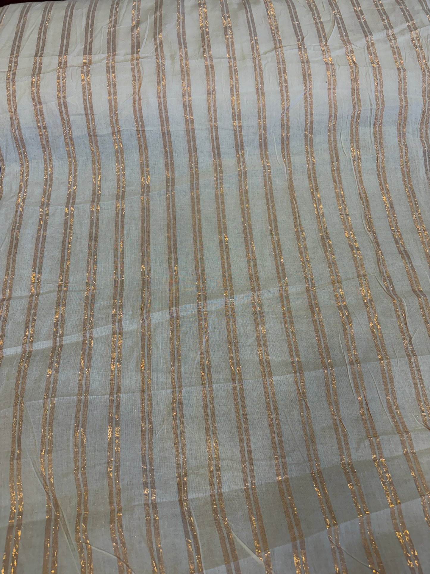 Cotton fabric with copper lurex line