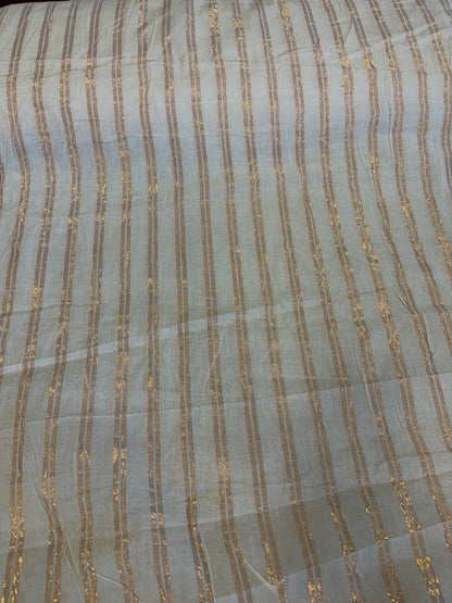 Cotton fabric with copper lurex line